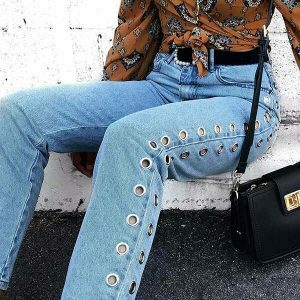 edgy grommet jeans with holed up design youthful appeal 7101